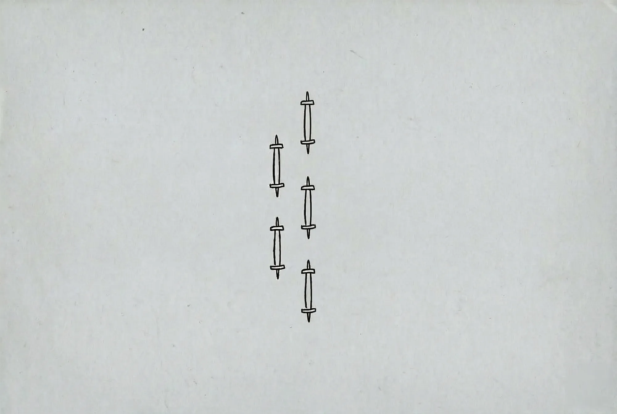 Das Bild zeigt eine Illustration von fünf Spindeln. Diese stehen sinnbildlich für die fünf Audit-Bots.
